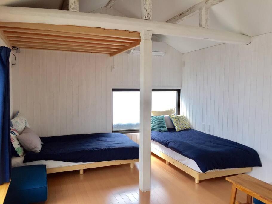 佐渡 ビーチまで0分 1客のみ オーシャンビュー Beach Side House ウッドデッキ 佐渡市 エクステリア 写真