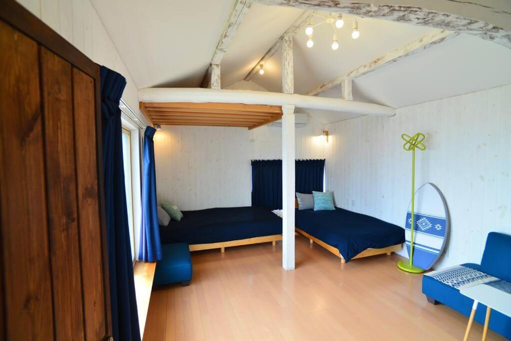 佐渡 ビーチまで0分 1客のみ オーシャンビュー Beach Side House ウッドデッキ 佐渡市 エクステリア 写真